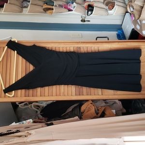 Sleeveless black knit dress with draping around the waist brand ruby size medium